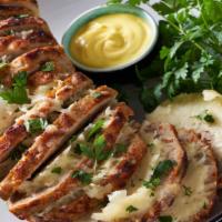 Meatloaf Dinner · Tender, savory, homemade meatloaf. Comes with garlic bread.