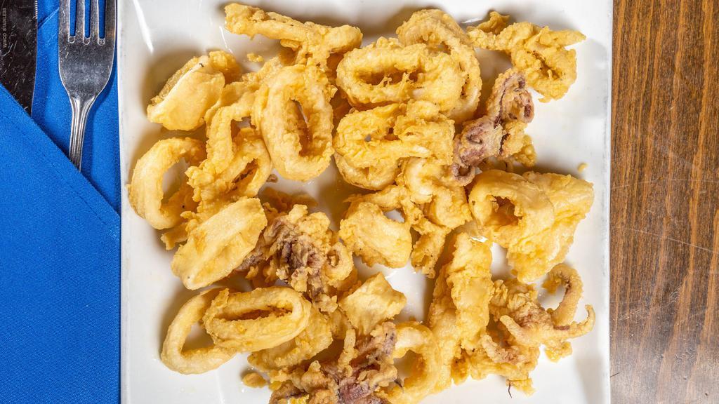 Fried Calamari · Gluten free. Tender squid is lightly fried and served with cocktail sauce.