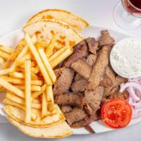 Gyro Plate · Beef and lamb slices served with pita, tzatziki sauce, tomatoes, onions and fries. Served wi...