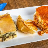 Spanakopita · Layers of spinach and Feta cheese baked in flaky filo dough.
