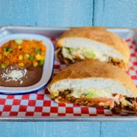 Torta Dinner · Mexican Torta with your choice of meat or vegetarian smothered with refried beans, topped wi...