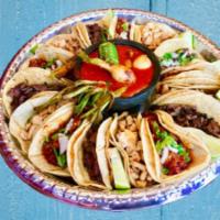 Taco Pa' Compartir · Taco tray.Includes your choice of 15 Tacos.Side of Rice & Beans.