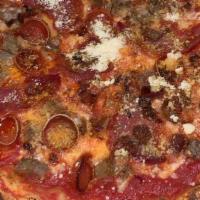 Carnivore · Mozzarella + Provolone | Pepperoni | Italian Sausage | Hot Salami | Bacon | Tomato Sauce