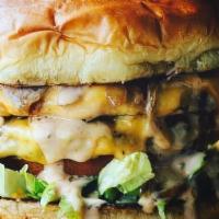 West Coast Burger · 2 1/4 Lb Burger Patties | American | Lettuce | Tomato | Caramelized Onions | Animal Sauce | ...