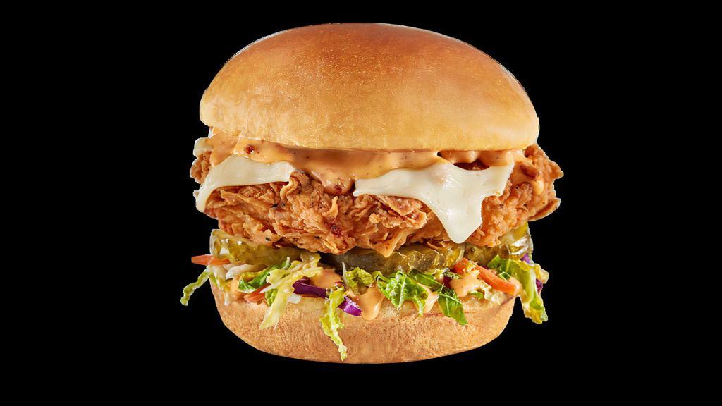 Wild Chicken Sandwich · Hand-breaded chicken breast topped with Wild sauce, mayo and pickles, served on a Challah bun.