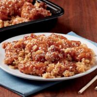 Sesame Chicken · Crisp, lightly breaded breast meat prepared in a sweet and tasty sauce, garnished with sesam...