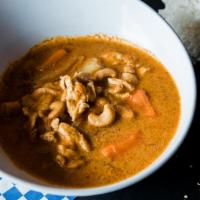 Massaman Curry · Thai Massaman curry flavor paste cooked with coconut milk and a choice of meats, potatoes, o...