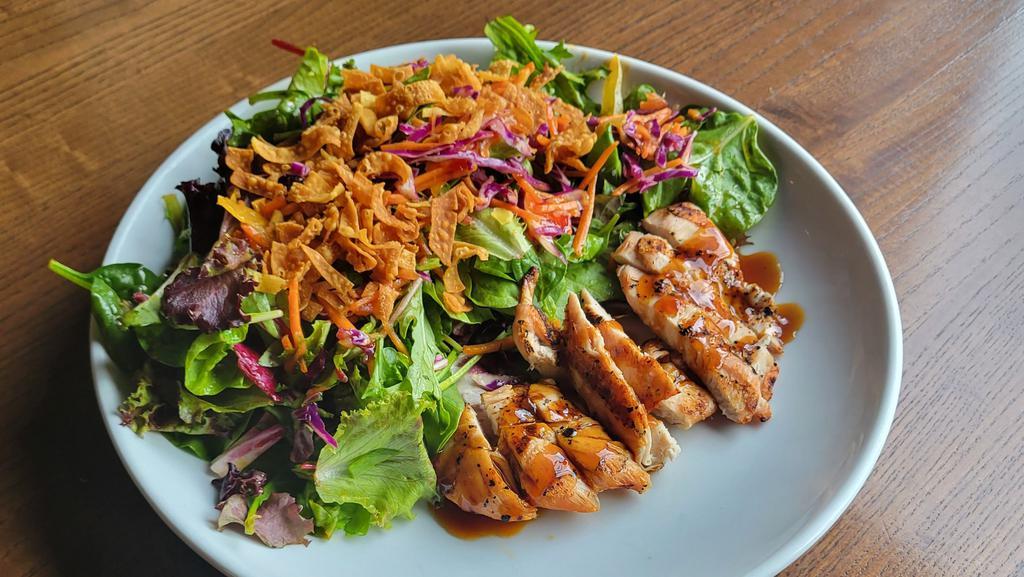 Asian Chop Salad · Grilled Chicken, Mixed Greens, Asian Slaw, Bell Pepper,
Carrot, Red Onion, Wontons, Sesame Seeds, Asian Vinaigrette