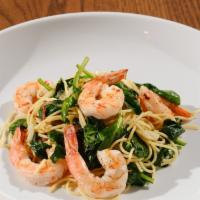 Shrimp Lemon Pasta · Grilled Shrimp, Spaghettini, Pearl Onions, Spinach,
Garlic, Lemon Butter Sauce