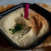 Hummus · A blend of chick peas, tahini paste, garlic and lemon and spice.