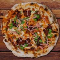 Smoked Bbq Brisket · Smoked Beef Brisket, Mixed Cheddar Cheese, Mozzarella, Green Onions, Cilantro, Pickle Red On...