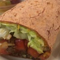 Deluxe Taco Wrap · Seasoned beef, lettuce, onions, tomatoes, and pepper jack cheese, served with salsa and sour...