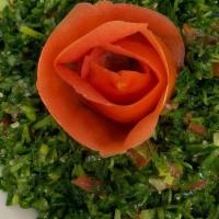 Tabouleh Salad · Freshly diced tomatoes, onions, parsley, and cracked wheat
gently tossed with olive oil and ...