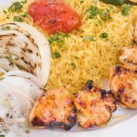 Chicken Kabob · Grilled chicken skewers with rice and grilled vegetables.