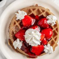 Our Belgium Waffle · Topped with your choice of kijafa cherries, blueberries, peaches, pecans, raspberries, banan...