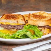 Patty Melt · 1/2 lb. beef patty on grilled rye bread, American cheese and sautéed onions.