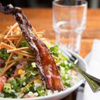 Whirly Chopped Salad · Romaine lettuce and kale, candied bacon, corn, Bleu cheese, tomato, red onion, fried tortill...