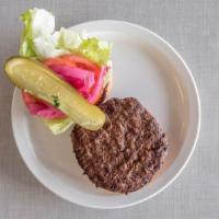 Woodward Classic Burger · Lettuce, tomatoes, and pickled onions on a challah bun. 100% USDA Angus ground beef, char-gr...