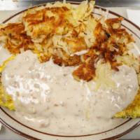 Country Omelet · Sausage, onions and cheddar cheese, topped with sausage gravy.