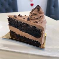 Torte | Chocolate Decadent (Gluten Free, Slice) | New · Flourless fudgey chocolate cake, chocolate mousse, chocolate buttercream and chocolate ganac...