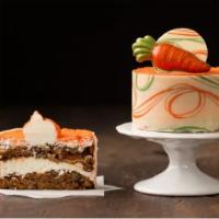 Carrot Cake · Layered carrot cake with a hint of cinnamon, walnut and pineapple, iced with cream cheese ic...