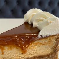 Salted Caramel Cheesecake | New · Brown sugar graham crust, salted caramel cheesecake, salted caramel topping and cream.