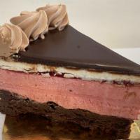 Torte | Chocolate Raspberry (Gluten Free) | New · Flourless chocolate cake, raspberry mousse, raspberry jam, vanilla buttercream and chocolate...