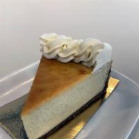 Cheesecake | Key Lime (Slice) · Graham crust, key lime cheesecake and key lime buttercream  decor.