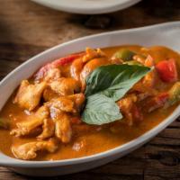 Panang Curry · Spicy. Choice of meat cooked with panang curry paste, coconut milk, and bell pepper.