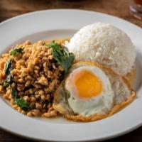 Ground Chicken Basil (Thai Style) · Ground chicken with garlic and Thai chili, basil over rice, and fried egg.