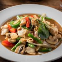 Spicy Basil Leaves · Stir fried chicken, basil leaves, chili pepper, onions, mushroom green bean, and bell pepper...