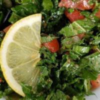 Tabouli Salad · Chopped fresh parsley, tomato, green onion, mint, cracked wheat with a lemon olive oil dress...