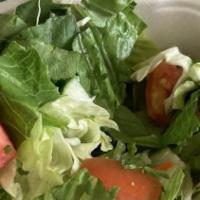 House Salad · Romaine and iceberg lettuce, tomato, cucumber, purple onion with house dressing.