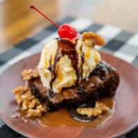 Brownie Sundae · Warm chocolate fudge brownie topped with vanilla ice cream drizzled with chocolate and caram...
