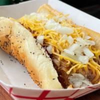 Chili Dog · Vienna all-beef dog, beef chili, yellow mustard, diced onions, and shredded cheddar cheese.