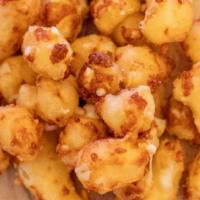 Fresh Battered Cheese Curds · Ellsworth cheese curds battered in-house and fried to order. Served with ranch dressing.