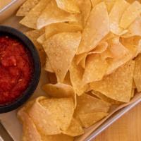 Chips & Salsa · House fried tortilla chips and salsa.