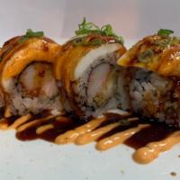 Chicago Bears Roll · Shrimp tempura and crabmeat inside.Topped with salmon and white tuna.Torch with spicy mayo ,...