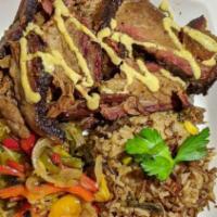 Sub-Saharan Brisket · Smoked brisket, jollof rice, veggies