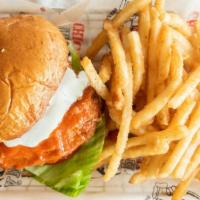 Buffalo Chicken Sandwich · Crispy fried chicken breast dipped in our buffalo sauce served on a pub bun with lettuce, to...