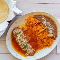 Chiles Rellenos · Two poblano peppers stuffed with cheese, covered in sour cream and a red sauce.

Your choice...