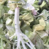 House Chopped Salad · Green goddess dressing, avocado, bacon, Monterey Jack , tomato, and artichokes.