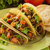 Ground Beef Taco With Salsa Roja · Classic corn tortilla stuffed with mild house spiced prime angus seasoned ground beef, lettu...