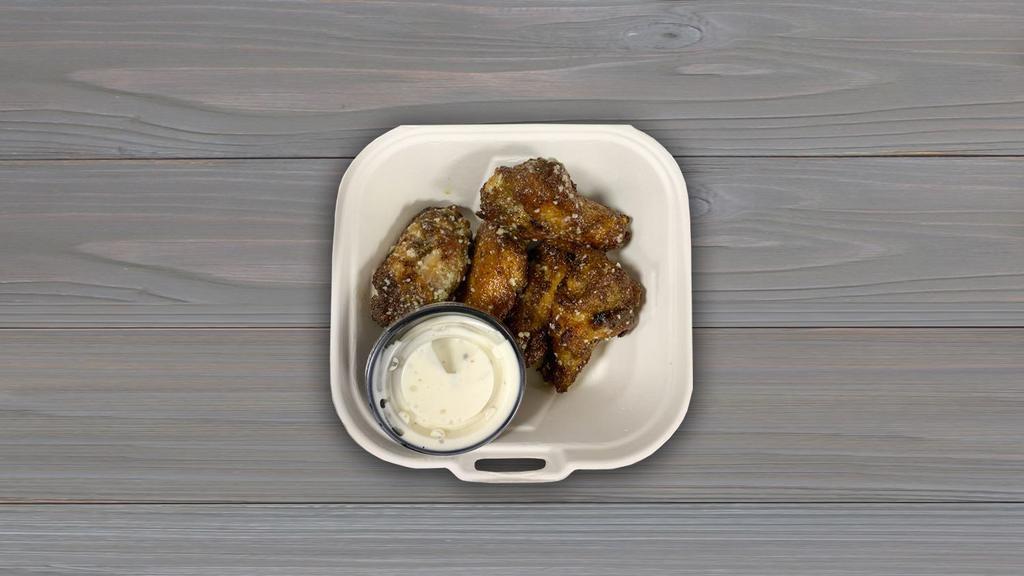 Chicken Wings · Five oven baked chicken wings tossed in your choice of sauce and served with a side of ranch.