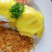 California Egg Benedict · Bacon, tomatoes, guacamole and hash browns.