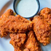 Chicken Wings (Buffalo - Mild) · premium breaded wings, cooked to perfection and smothered in Buffalo - Mild sauce
(approx. 7...