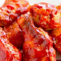 Chicken Wings (Bbq) · premium breaded wings, cooked to perfection and smothered in BBQ sauce
(approx. 7 wings per ...