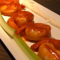 Buffalo Shrimp · jumbo shrimp tossed in spicy buffalo sauce and served with ranch