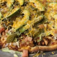 Taco Pizza · pizza sauce, ground beef and jalapeños topped with lettuce,
tomato, onion, avocado, and ched...