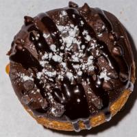 Chocoholic · Chocolate dip topped with chocolate chips, chocolate drizzle and dusted with powdered sugar.